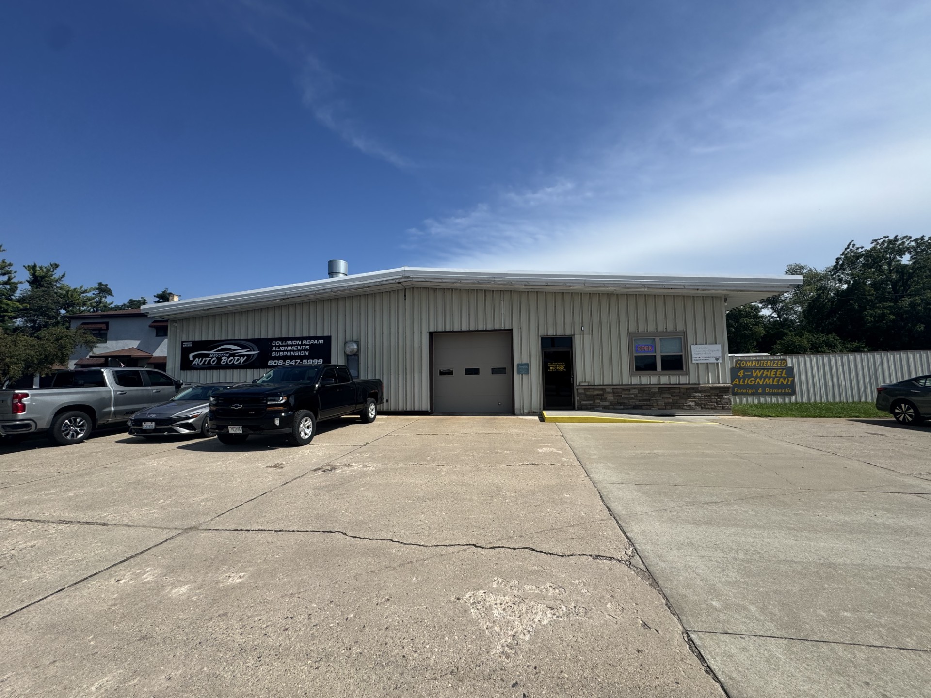 Mauston Auto Body shop building